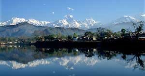 Reflections of the Annapurna range on Phewa Tal, Pokhara.
